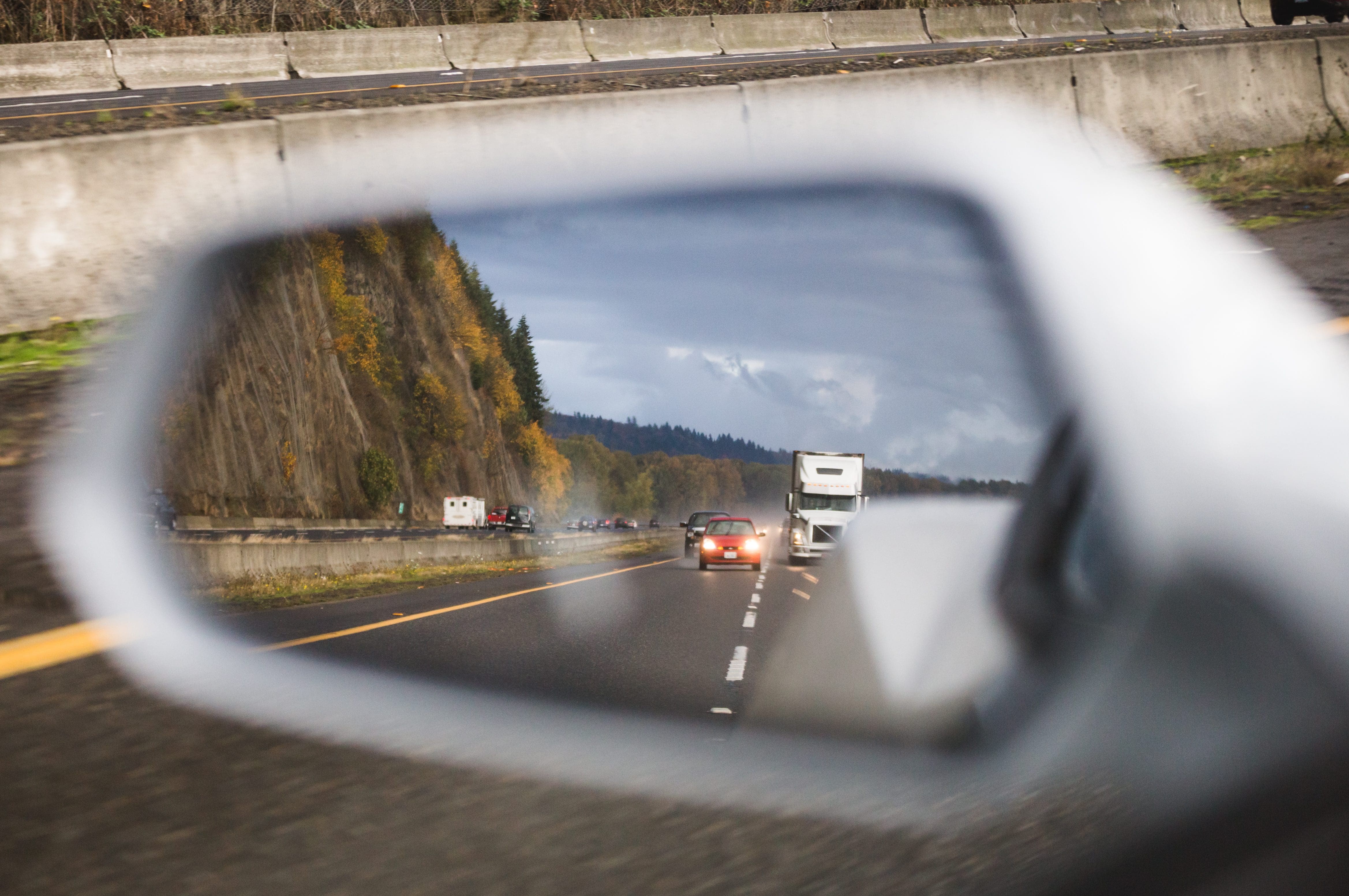 cropped-bigstock-Traffic-In-Side-View-Mirror-209188348-1.jpg